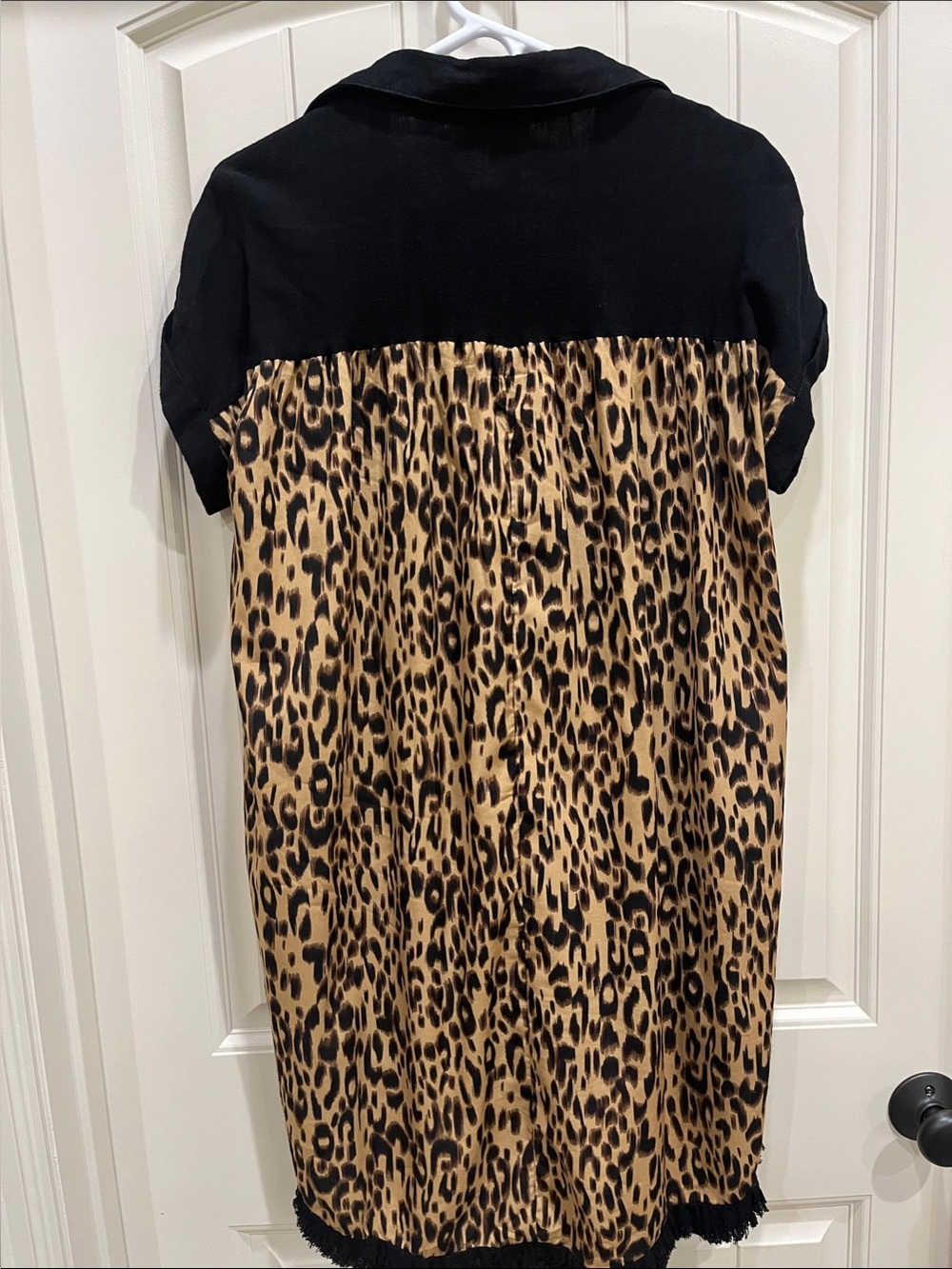 Umgee Black Tunic with Leopard Print Side & Back. Easy to layer & fun style.